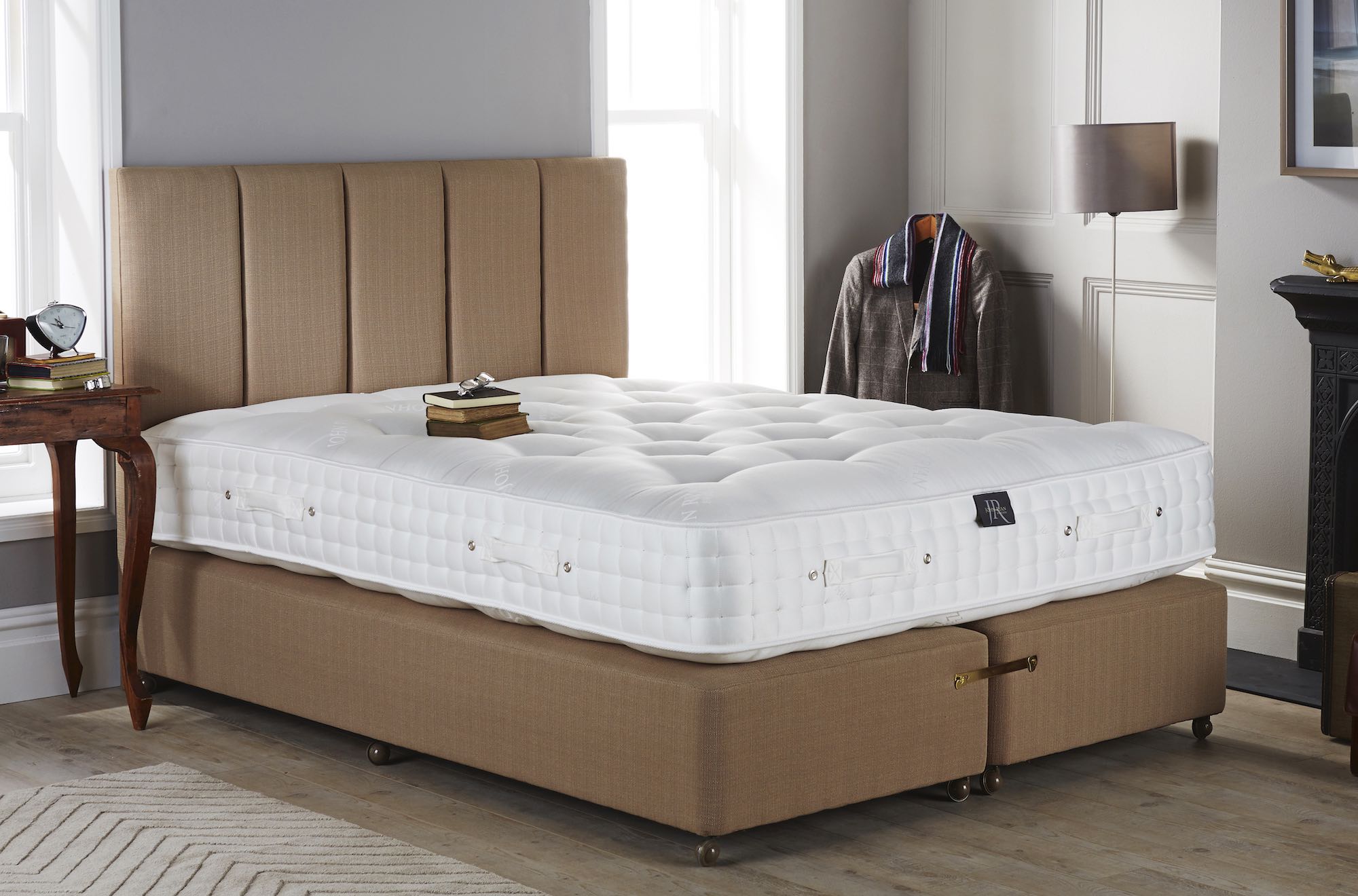 A kingsize mattress in a bedroom