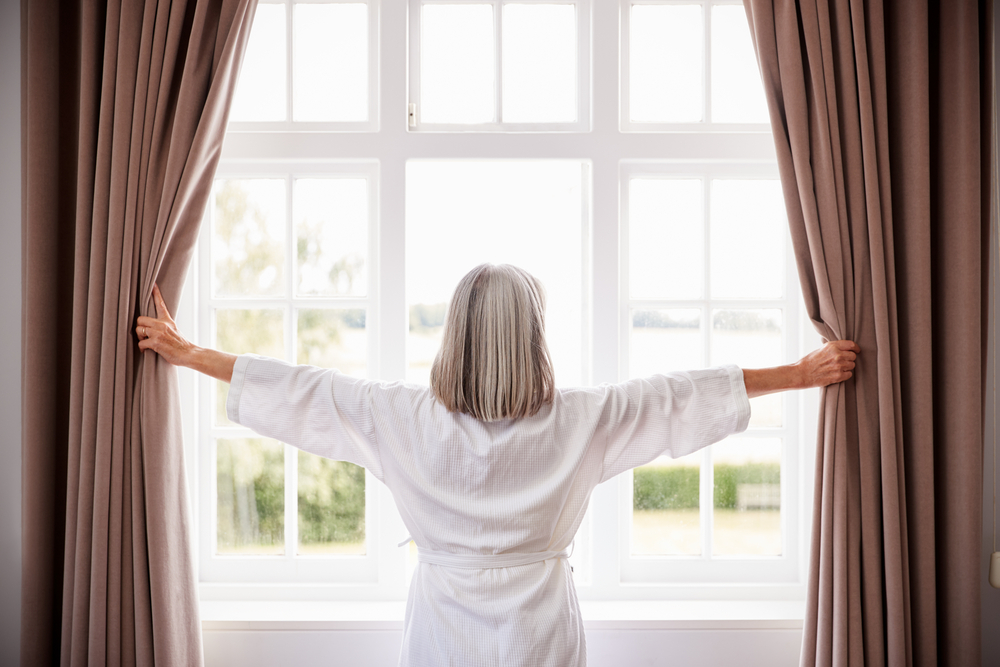 Opening bedroom curtains