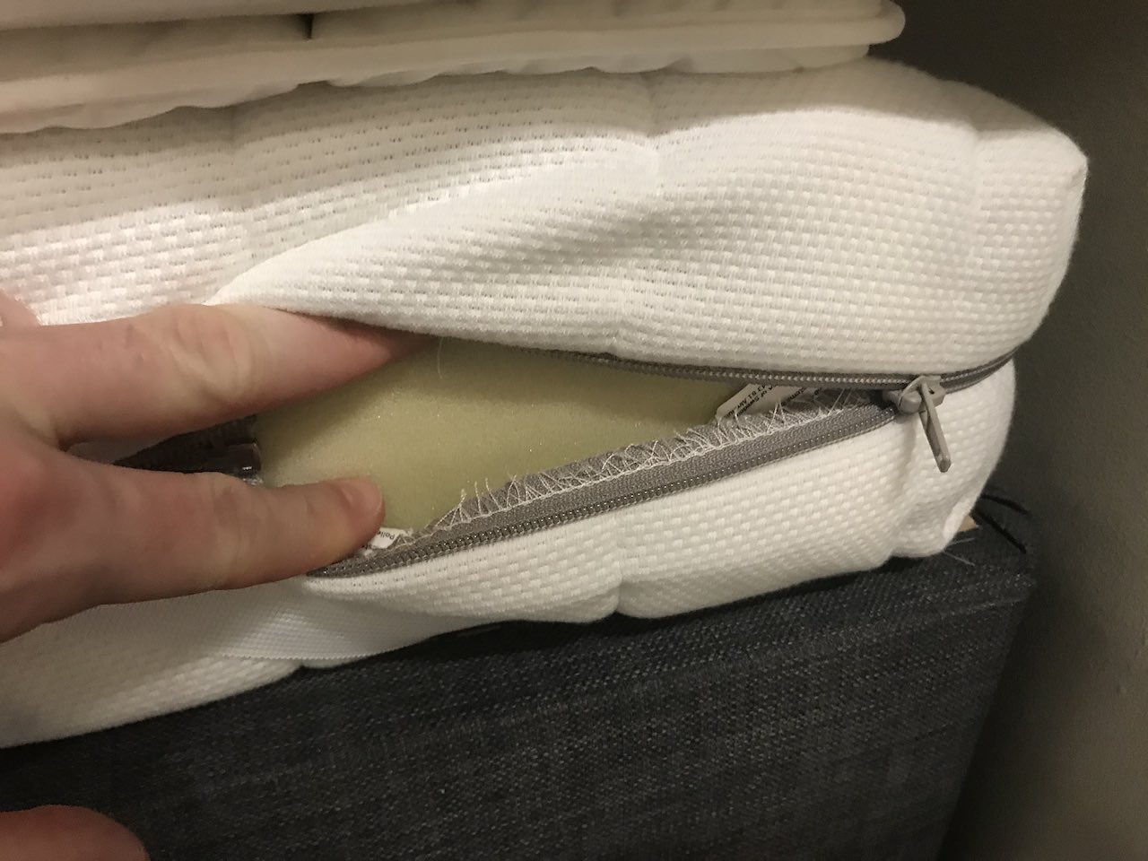 The foam inside an ikea mattress being shown