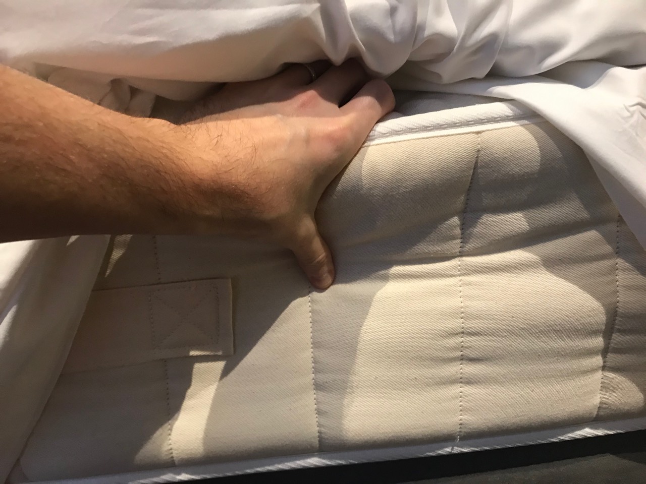 Checking an open coil mattress