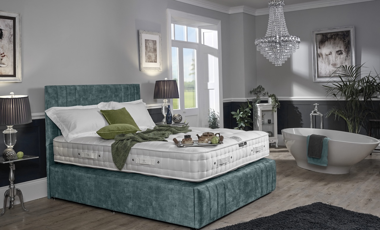 A green hand made bed base and john ryan natural fibre mattress