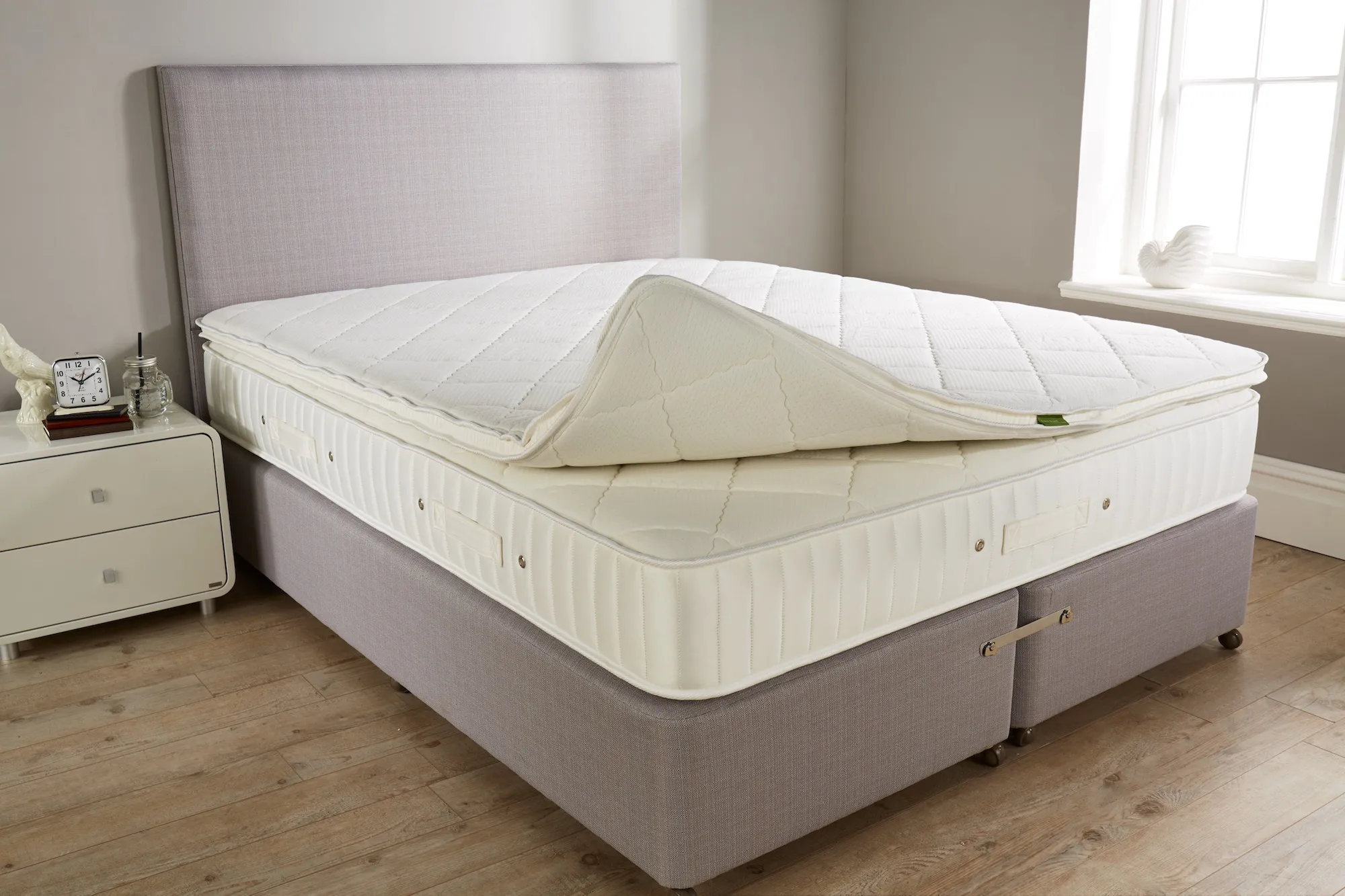 A natural latex mattress topper