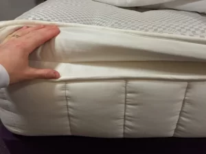 Close up of pillowtop mattress on John Ryan By Design website