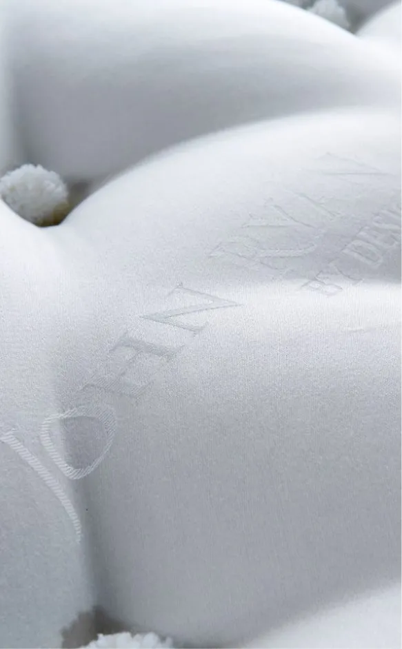 Close up of Artisan natural fibre mattress with tufting