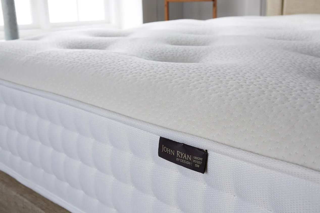Origins Pocket 1500 mattress with close up of John Ryan Label