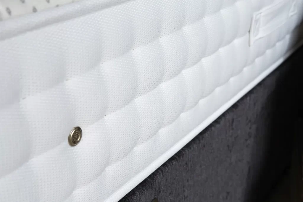 Close up of side panel on Origins Pocket Latex 1500 John Ryan Mattress