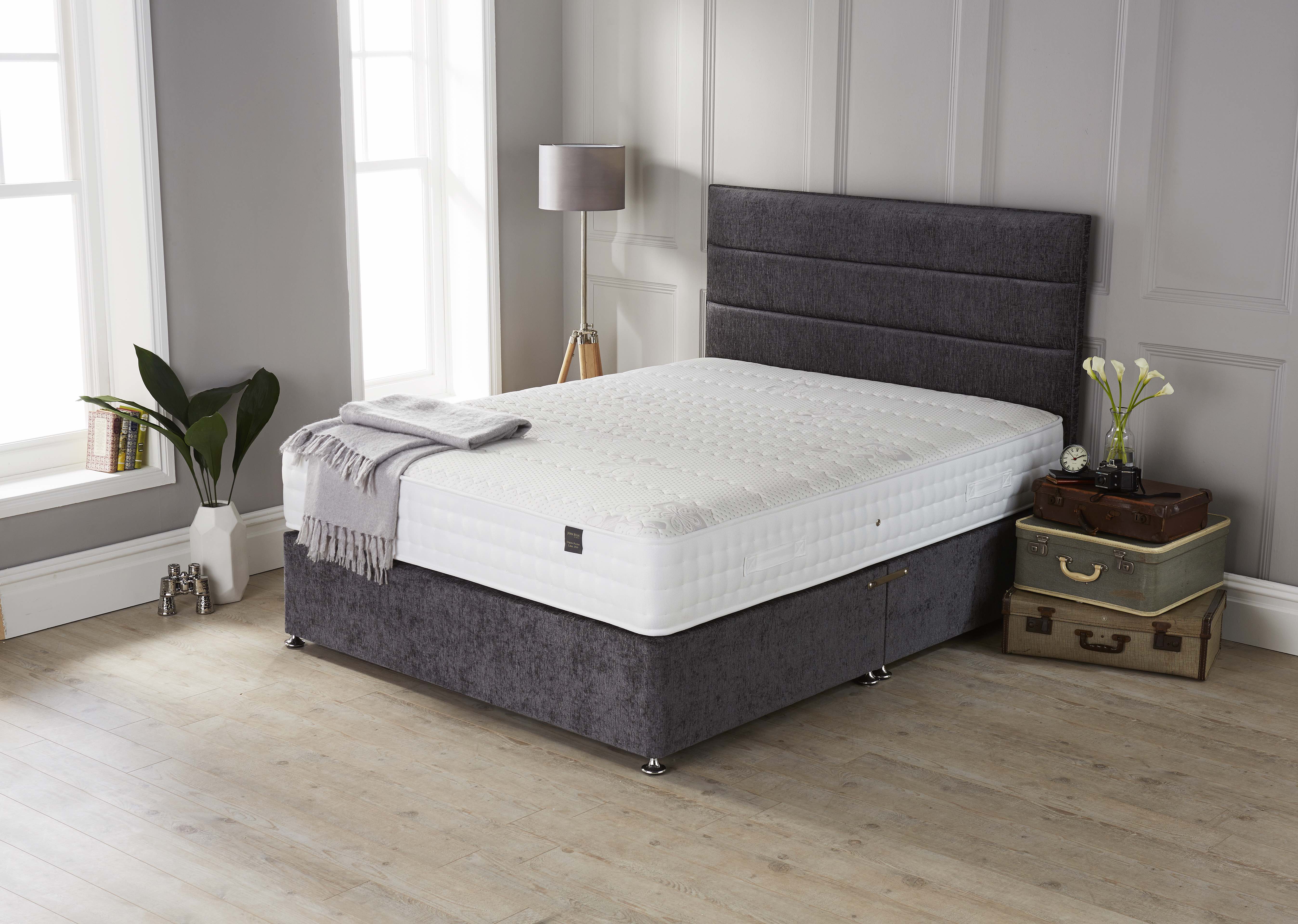 Origins latex pocket sprung mattress on a full bed base