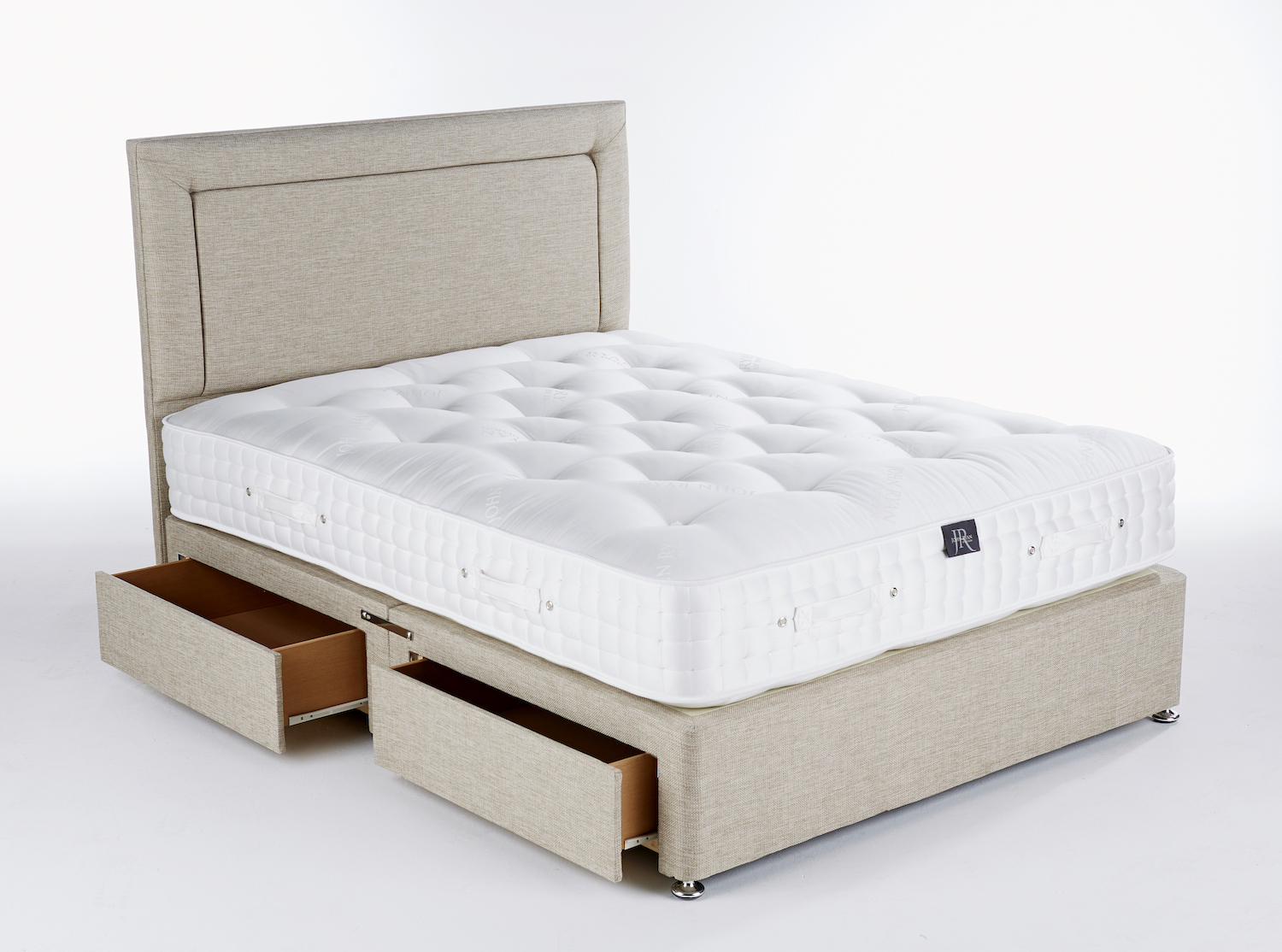 Pocket sprung mattress on a divan bed base