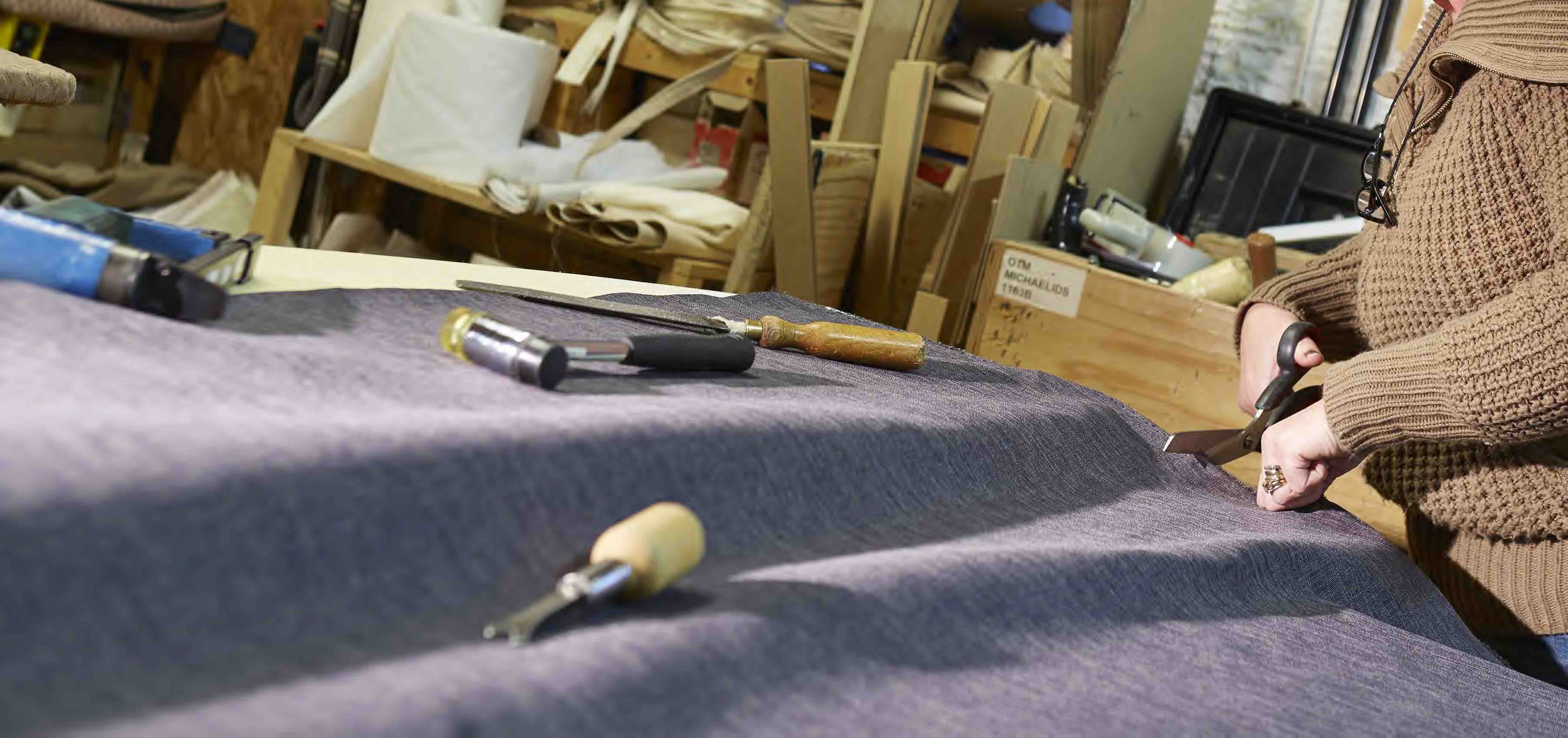 Seamstress using Charcoal Bracken fabric for headboards